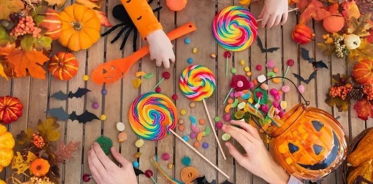 Lots of Halloween candy on a table