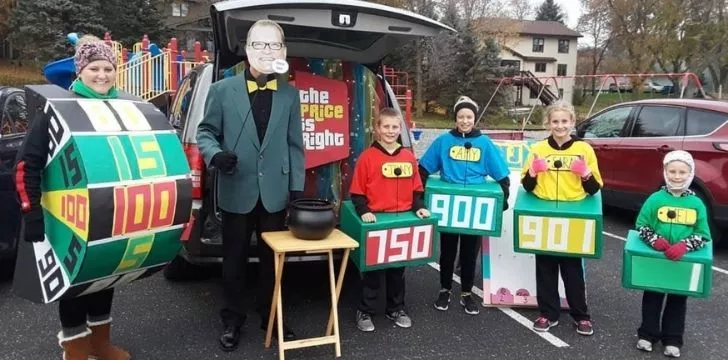 A family trunk or treating from the trunk of their car