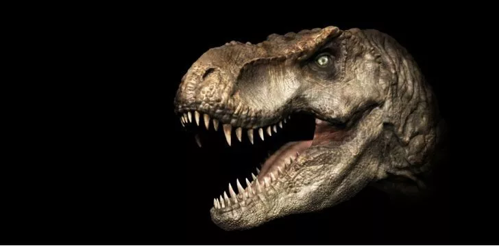 Страшно изглеждащ T-Rex, показващ всичките си зъби.