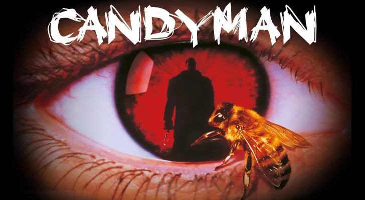 Думата candyman, написана над око с червен ирис.  Зеницата на окото е силуетът на човек, а на окото има пчела.