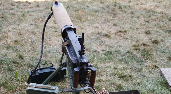 A WWI machine gun sits ready for use