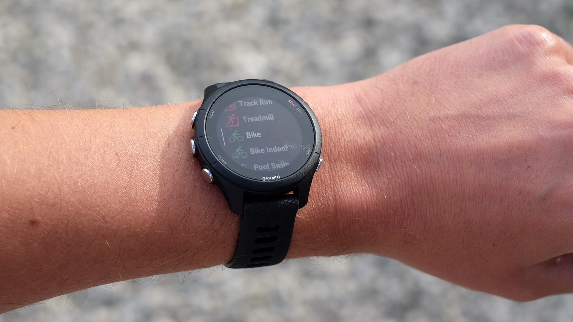 Garmin Forerunner 255 being tested on wrist