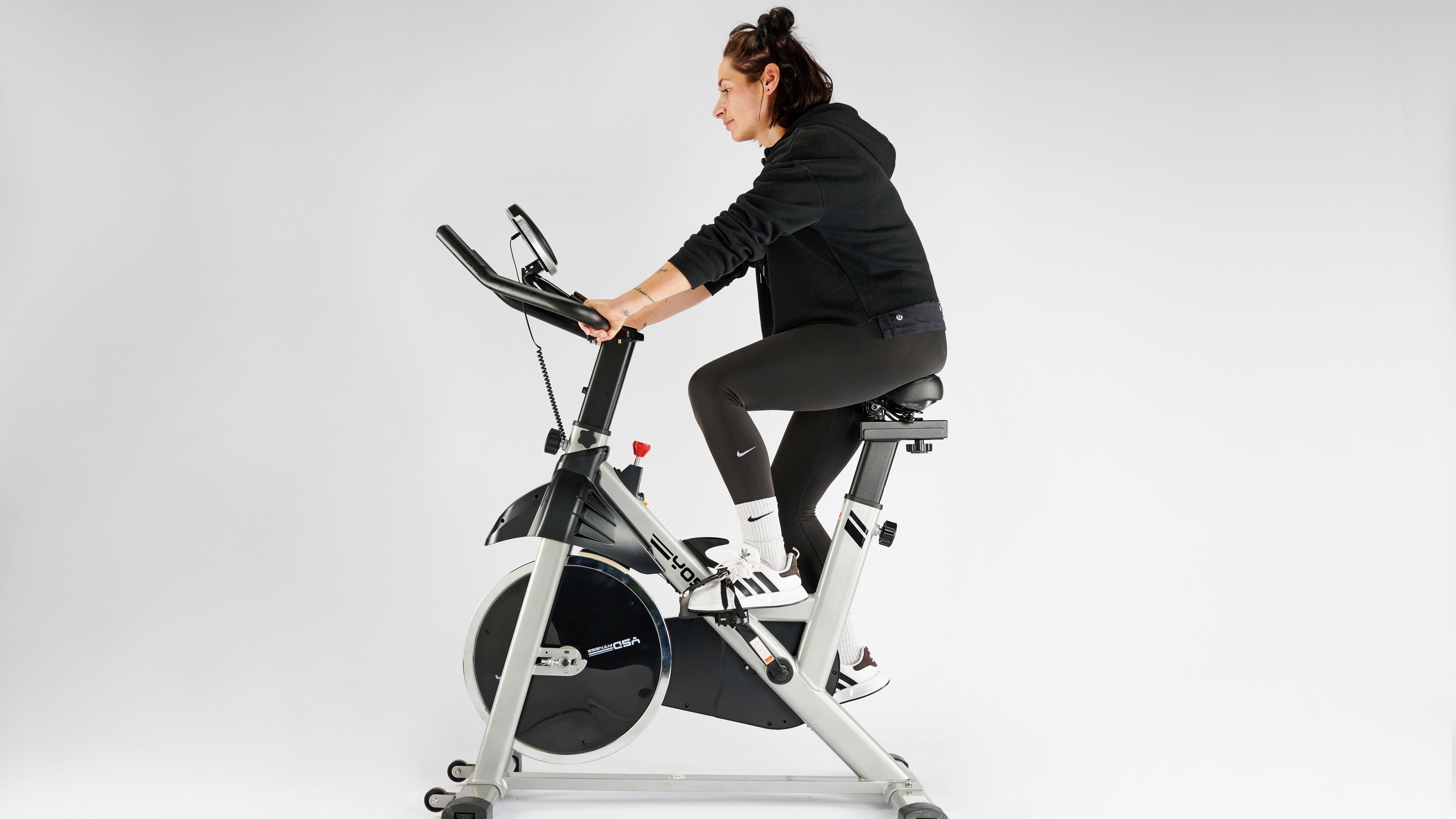 Yosuda exercise bike being tested by Sam Hopes, resident fitness writer at Live Science